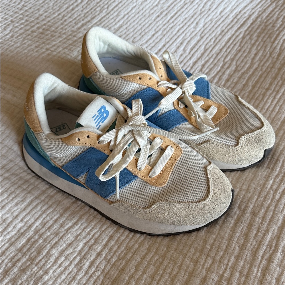 New Balance Women’s Cream and Blue Sneakers